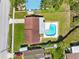 Aerial view of property showing the house, backyard, pool, and surrounding neighborhood at 302 Patty Dr, Oldsmar, FL 34677