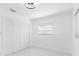 Bedroom featuring a closet, bright walls, with natural light from the window at 302 Patty Dr, Oldsmar, FL 34677