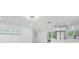 Bright, open-concept kitchen featuring stainless appliances, and recessed and pendant lighting at 302 Patty Dr, Oldsmar, FL 34677