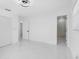 Main bedroom showing doorways to the closet and bathroom at 302 Patty Dr, Oldsmar, FL 34677
