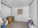 Unfinished interior storage room with white concrete block walls, great for extra storage space at 302 Patty Dr, Oldsmar, FL 34677