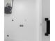 Utility room with a tankless water heater and modern fixtures at 302 Patty Dr, Oldsmar, FL 34677