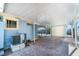 Attached covered carport with brick pavers and access to an enclosed garage at 3108 Dupont S St, Gulfport, FL 33707