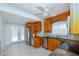 A well-lit kitchen with stainless steel appliances and tile flooring at 3108 Dupont S St, Gulfport, FL 33707