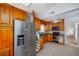 Traditional kitchen featuring stainless steel appliances and wood cabinets at 3108 Dupont S St, Gulfport, FL 33707