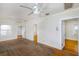 Bright living room with hardwood floors and large windows, ready for renovations at 3108 Dupont S St, Gulfport, FL 33707