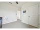 Open bedroom area showing ample floor space and access to other rooms, plus natural light at 33524 Elm Hill Br, Wesley Chapel, FL 33545