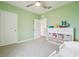 Another spacious bedroom with neutral walls and carpet, including a ceiling fan and closet at 33524 Elm Hill Br, Wesley Chapel, FL 33545