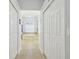 Hallway view of soaking tub surrounded by decorative tile in bathroom at 3737 Gaviota Dr, Sun City Center, FL 33573