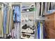 Custom closet features storage shelves and hanging rods for optimal organization at 3737 Gaviota Dr, Sun City Center, FL 33573