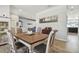 Cozy dining room with a traditional table setting and easy access to adjacent living areas at 3737 Gaviota Dr, Sun City Center, FL 33573