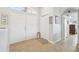 Welcoming foyer with double doors, tile flooring, and ample closet space at 3737 Gaviota Dr, Sun City Center, FL 33573