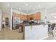 Bright kitchen features stainless steel appliances, granite countertops, and ample cabinet space at 3737 Gaviota Dr, Sun City Center, FL 33573
