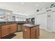 Open kitchen with granite countertops, stainless steel appliances, an island, and an eat-in area at 3737 Gaviota Dr, Sun City Center, FL 33573