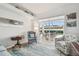 Inviting living room with sliding glass doors, comfortable seating, and stylish decor at 3737 Gaviota Dr, Sun City Center, FL 33573