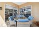 Cozy patio area with comfortable seating, ideal for enjoying meals and outdoor gatherings at 3737 Gaviota Dr, Sun City Center, FL 33573
