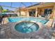 Beautiful pool and spa with a screened-in lanai, ideal for relaxation and entertaining in a private outdoor space at 3737 Gaviota Dr, Sun City Center, FL 33573