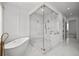 Elegant bathroom featuring a soaking tub and frameless glass walk-in shower at 403 E Davis Blvd, Tampa, FL 33606