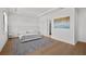 Bright primary bedroom features recessed lighting, an accent rug and ensuite access at 403 E Davis Blvd, Tampa, FL 33606