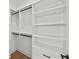 Organized walk-in closet with ample shelving and hanging space, perfect for storage and organization at 403 E Davis Blvd, Tampa, FL 33606