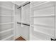 Spacious walk-in closet with built-in shelving and ample storage for your wardrobe at 403 E Davis Blvd, Tampa, FL 33606