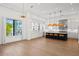 Gourmet kitchen with island, stainless steel appliances, and stylish pendant lighting at 403 E Davis Blvd, Tampa, FL 33606