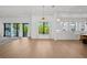 Bright open floor plan with living room, dining room, and kitchen at 403 E Davis Blvd, Tampa, FL 33606