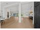 Spacious open-concept living room featuring hardwood floors and abundant natural light at 403 E Davis Blvd, Tampa, FL 33606