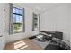 Bright office space with two windows, a modern desk, and neutral decor at 403 E Davis Blvd, Tampa, FL 33606