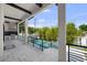Spacious outdoor kitchen, featuring stainless steel appliances, ideal for entertaining alongside the pool area at 403 E Davis Blvd, Tampa, FL 33606