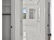 Contemporary walk-in closet features natural light and custom shelving for ample storage at 403 E Davis Blvd, Tampa, FL 33606