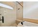 Luxurious bathroom featuring a glass-enclosed shower and separate soaking tub at 407 S Fremont Ave # B, Tampa, FL 33606
