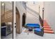 Outdoor courtyard featuring staircase, seating, and grill, perfect for entertaining and relaxation at 407 S Fremont Ave # B, Tampa, FL 33606