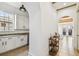 Galley kitchen with white cabinets, granite countertops, and stainless steel appliances in a modern home at 407 S Fremont Ave # B, Tampa, FL 33606