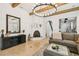 Living room boasts modern fireplace, stylish decor, and sleek media console with light colored flooring at 407 S Fremont Ave # B, Tampa, FL 33606