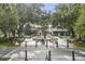 View of a fountain in the center of the park, surrounded by shops and dining at 407 S Fremont Ave # B, Tampa, FL 33606