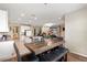 Open-concept kitchen and dining area, seamlessly flowing into the living space, perfect for modern living and entertaining at 4917 Eagle Rock Dr, Wimauma, FL 33598