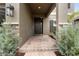 Charming front entrance with a paved walkway and meticulously maintained landscaping at 4917 Eagle Rock Dr, Wimauma, FL 33598