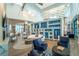 Elegant clubhouse lounge area with stylish furniture and decor at 5090 Caravel Pt, Land O Lakes, FL 34638