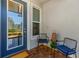 Cozy front porch with seating, creating an inviting entrance to the home at 5090 Caravel Pt, Land O Lakes, FL 34638