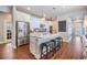 Spacious kitchen with stainless steel appliances, a large island, and ample counter space at 5090 Caravel Pt, Land O Lakes, FL 34638