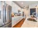 Well-equipped kitchen with stainless steel appliances, stylish backsplash, and granite countertops at 5090 Caravel Pt, Land O Lakes, FL 34638