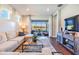 Comfortable living room with stylish decor and a view of the water at 5090 Caravel Pt, Land O Lakes, FL 34638