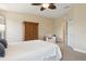 Comfortable bedroom with carpet, shutters and closet at 542 Harbor Ridge Dr, Palm Harbor, FL 34683