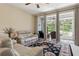 Inviting living room features a screened-in patio and plush seating for relaxation at 542 Harbor Ridge Dr, Palm Harbor, FL 34683