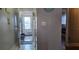 Inviting foyer with tile flooring, views into other rooms, and coastal-themed decorations at 5501 80Th N St # 207, St Petersburg, FL 33709