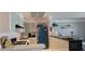 Charming kitchen offering ample counter space and seamless access to the living area at 5501 80Th N St # 207, St Petersburg, FL 33709