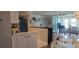 Inviting living room showcasing a seamless transition into the kitchen and dining area at 5501 80Th N St # 207, St Petersburg, FL 33709