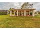 Open-air pavilion with picnic tables, ideal for outdoor dining and enjoying the community grounds at 5501 80Th N St # 207, St Petersburg, FL 33709