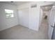 Bright bedroom with window and closet doors, offering ample storage space at 5608 Larimer Dr, Tampa, FL 33615